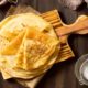 delicious-winter-crepe-dessert-with-jam-sugar_23-2148717362