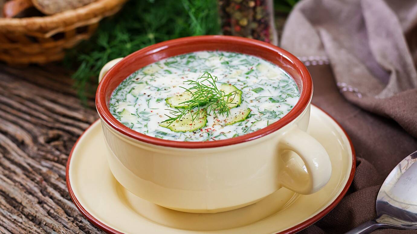 summer-yogurt-cold-soup-with-egg-cucumber-dill-wooden-table_2829-18834