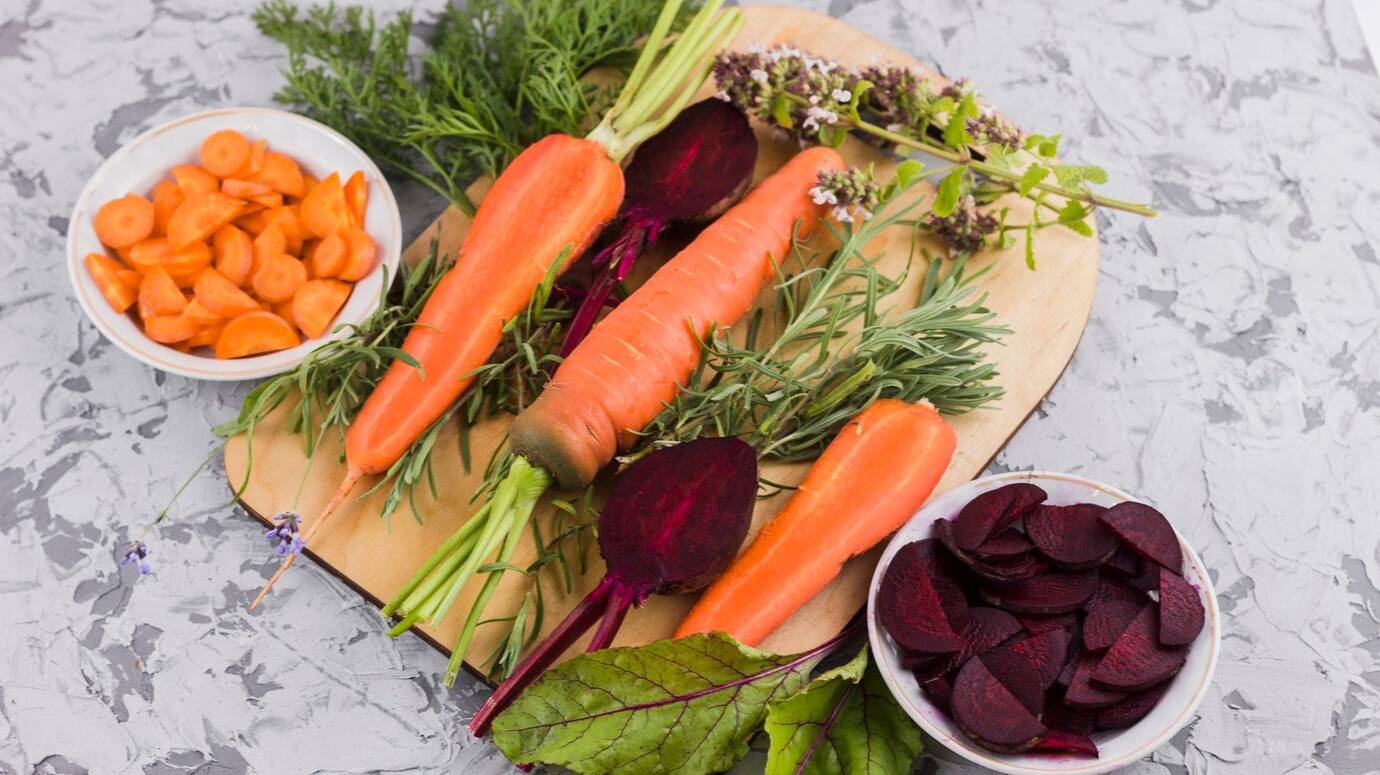 beetroot-carrot-wooden-board_23-2148253273