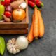 front-view-fresh-vegetables-with-pepper-garlic-dark-table-ripe-salad-color-health_140725-124767