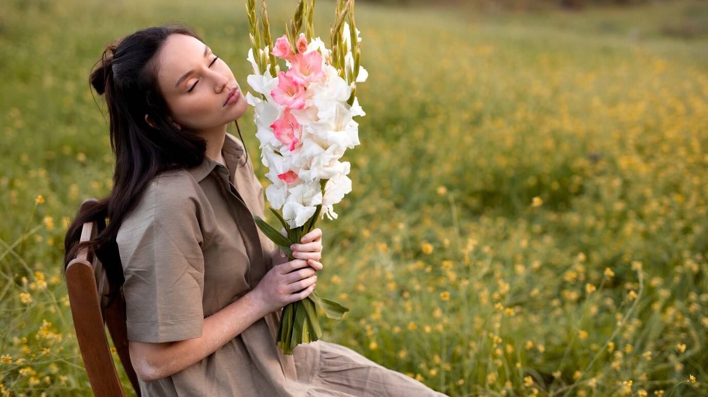 young-woman-with-gladiolus-nature_23-2149441817