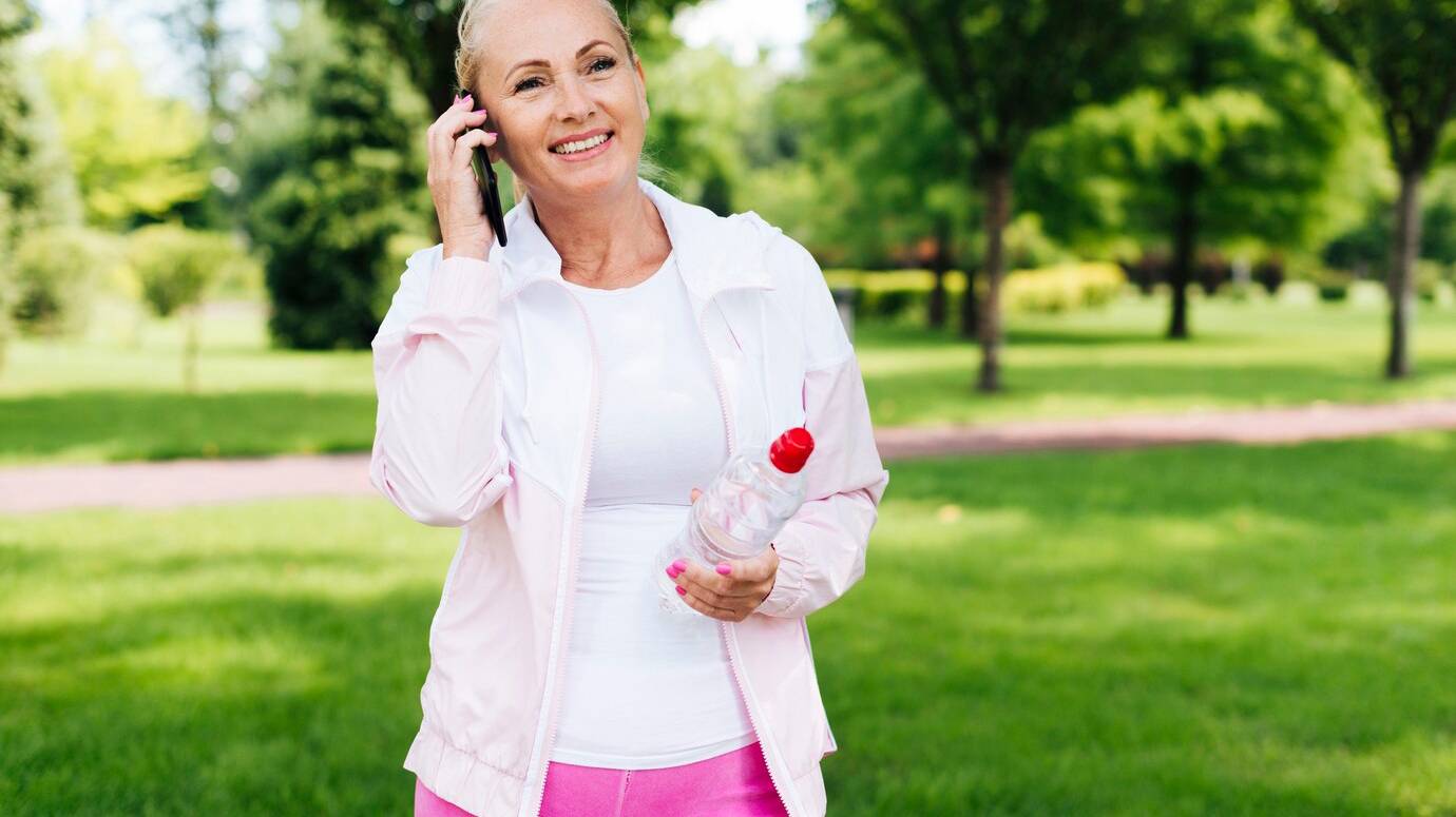 medium-shot-woman-talking-phone_23-2148247261