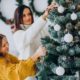 mother-with-daughter-decorating-christmas-tree_1303-25465