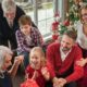 people-enjoying-festive-christmas-gathering_23-2149174115