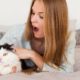 woman-bed-wearing-pajamas-with-cat_23-2148557231